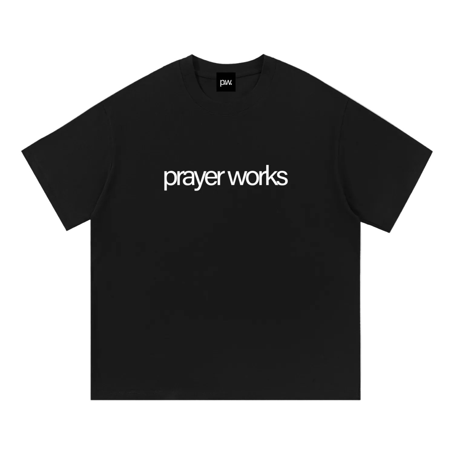 Black t-shirt with 'prayer works' text on a white background